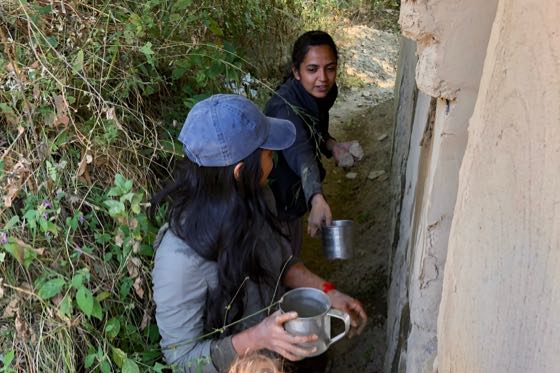 Learning to apply mud plaster